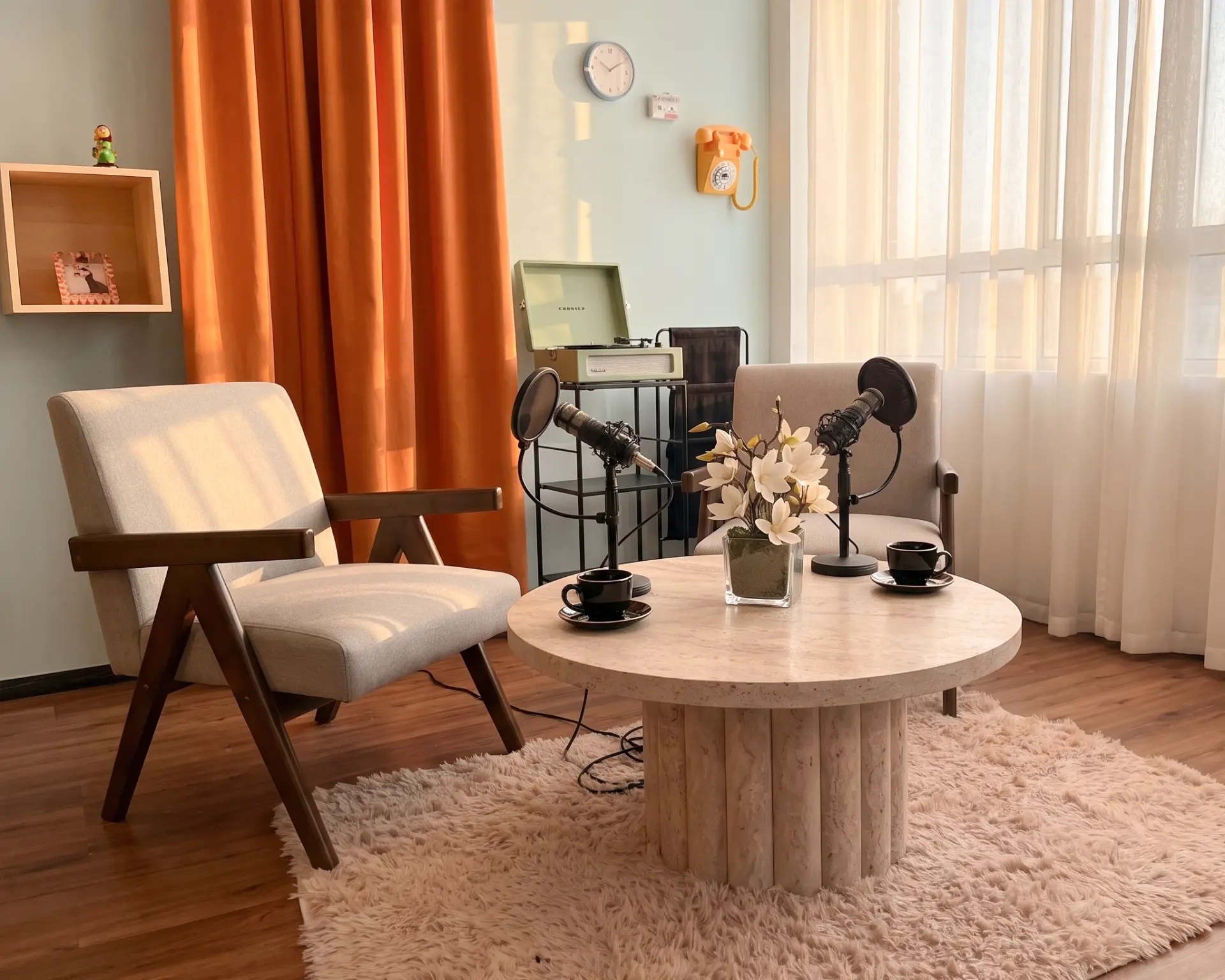 Acoustically treated podcast recording studio with broadcast microphones — view 2